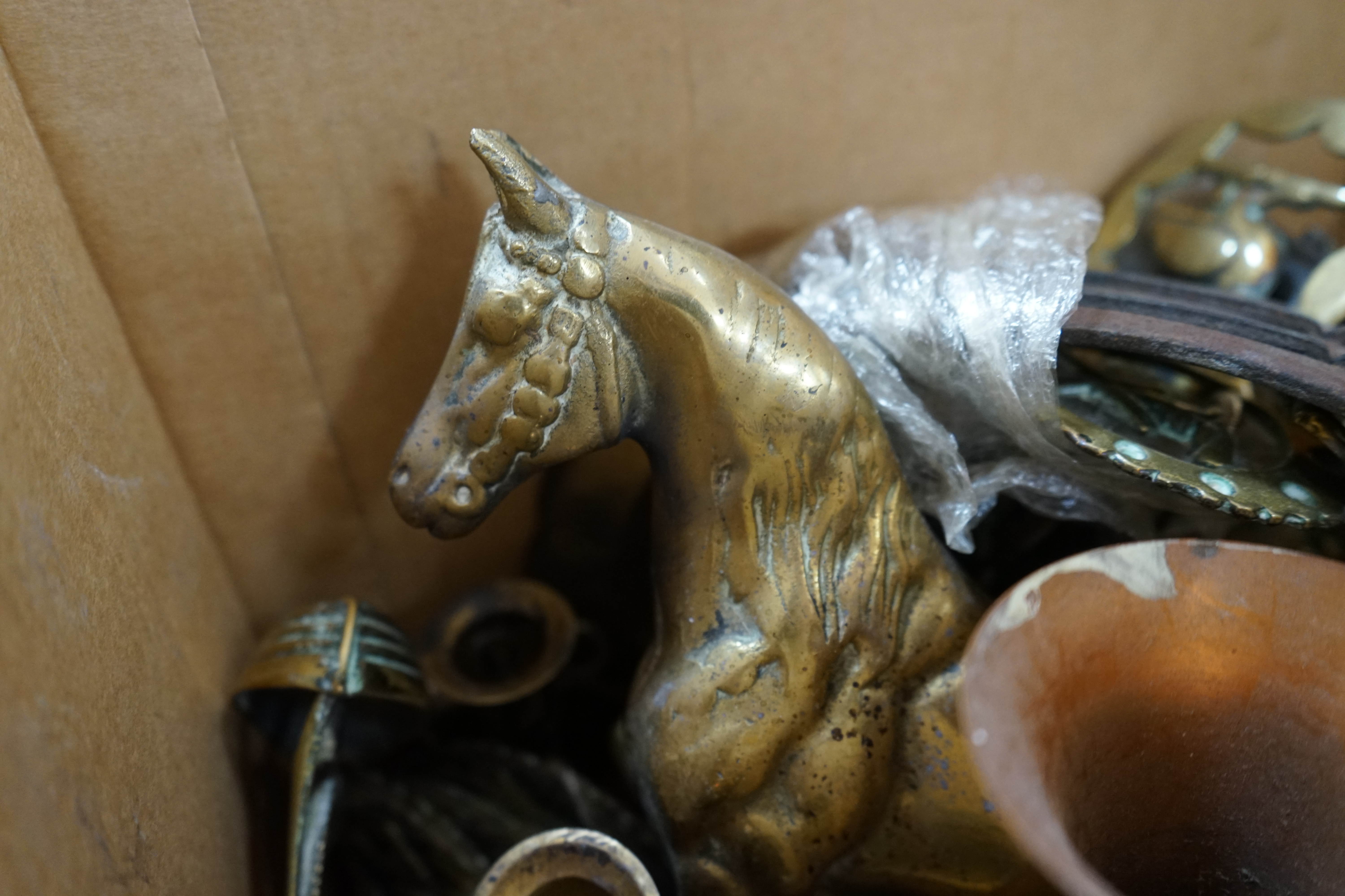 A quantity of Victorian and later copper and metalware to include horse brasses and a bugle. Condition - varies